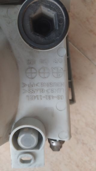 Faro delantero izquierdo FORD ESCORT 084311142L