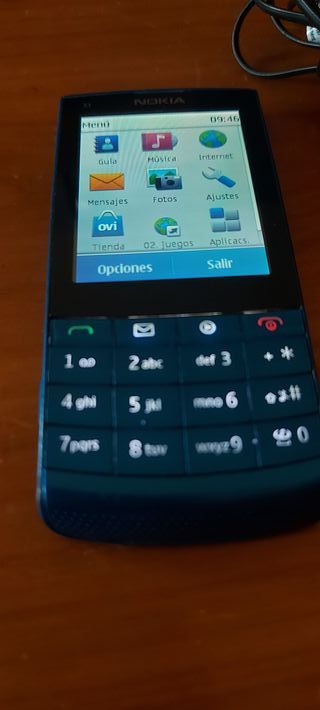 Nokia x3 tactil . Movistar , con cargador .