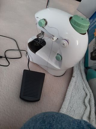 Máquina de coser portatil