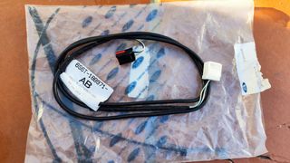 Cable auxiliar Ford 