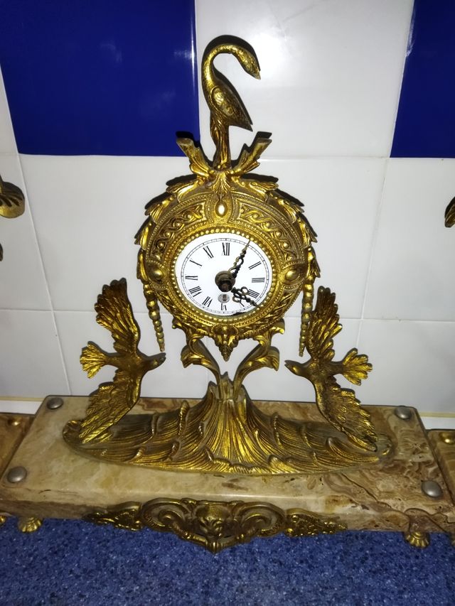 orologio molto antico.. bronzo e marmo con portacandele