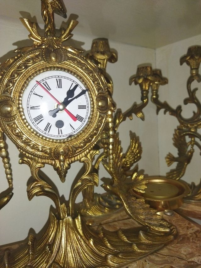 orologio molto antico.. bronzo e marmo con portacandele