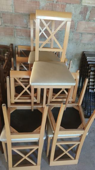 Lote sillas de madera acolchadas