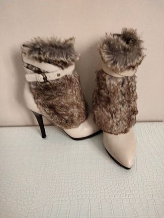 Botines Guess. preciosas botas muy originales