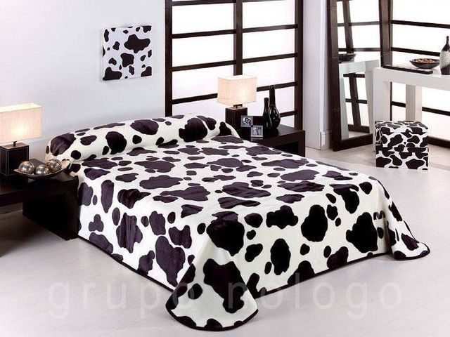 Manta. estampado de vaca para cama de 90