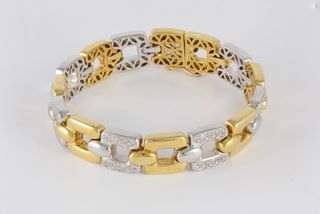 Pulsera en oro amarillo y blanco con brillantes