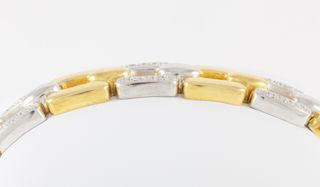Pulsera en oro amarillo y blanco con brillantes