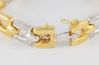 Pulsera en oro amarillo y blanco con brillantes