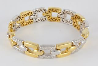 Pulsera en oro amarillo y blanco con brillantes