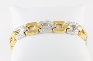 Pulsera en oro amarillo y blanco con brillantes