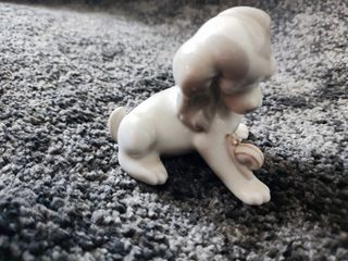 Figura LLADRÓ porcelana perro y caracol.