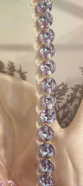 Vestido de confección de fiesta.