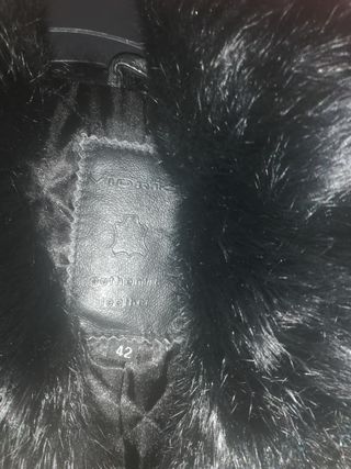 abrigo negro de piel 
