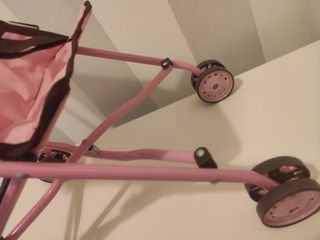 Sillita de paseo rosa plegable marca Arias