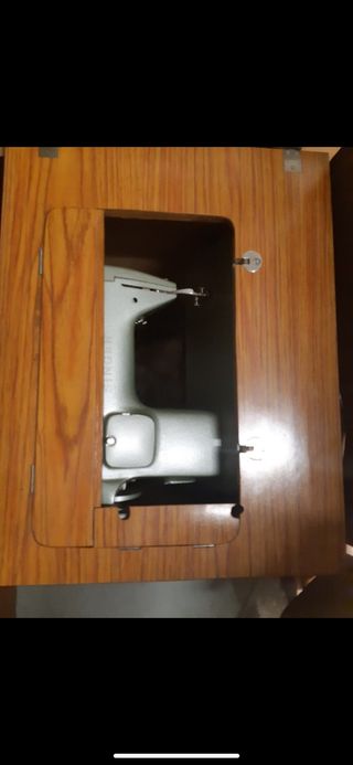 Máquina de coser singer con armario