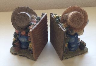 PAREJA DE SUJETA LIBROS