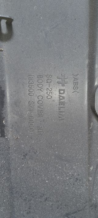 tapas plásticos cachas laterales daelim s2