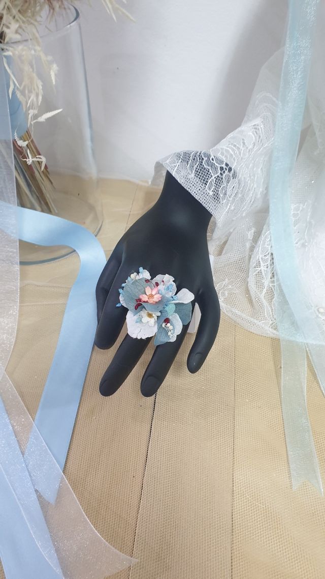 Anillos con flor preservada
