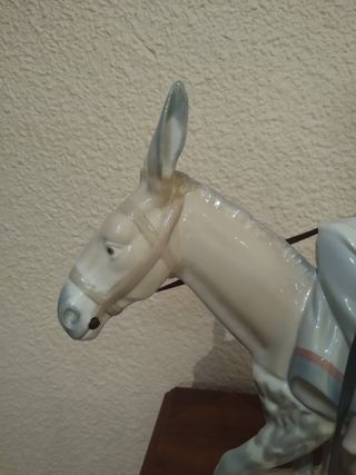 Lladro Tang or Rosal Country Woman Donkey.
