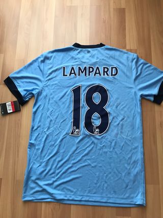 Camiseta firmada Manchester City