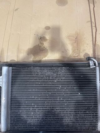 Radiador de aire acondicionado y radiador central