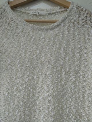 Jersey beig hilo dorado