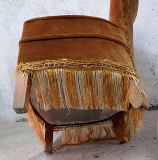 Butaca aterciopelada.