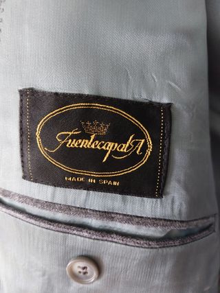 Traje de caballero en perfecto estado