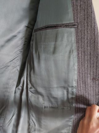 Traje de caballero en perfecto estado