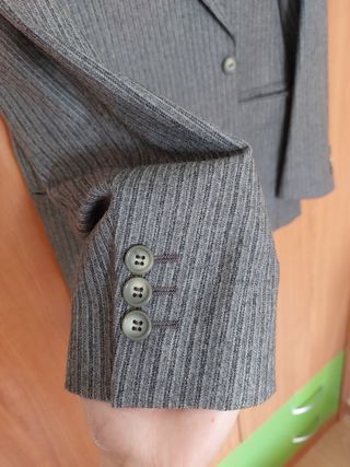 Traje de caballero en perfecto estado