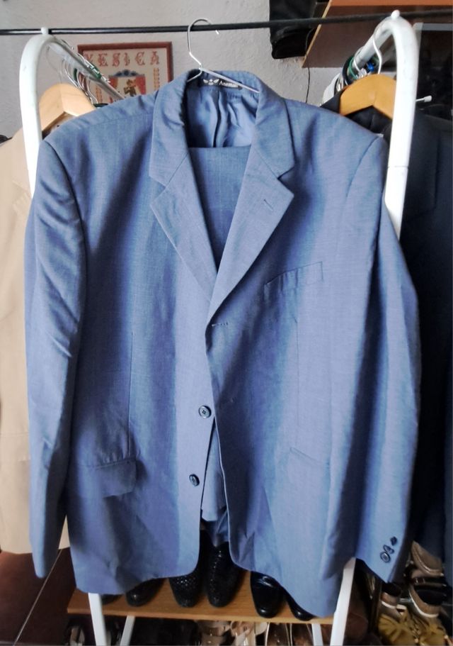 traje de chaqueta hombre en azul grisoso
