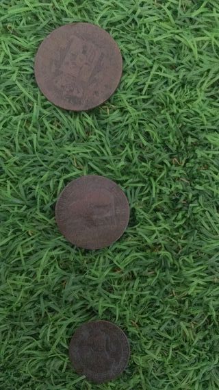 Monedas y billetes de peseta antiguos