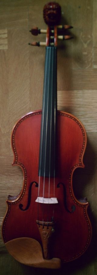 VIOLIN COMPLETO 4/4 CON CABEZA LEON Y CORDAL TALLA