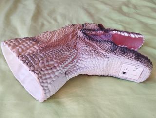 cabeza de dinosaurio marioneta.