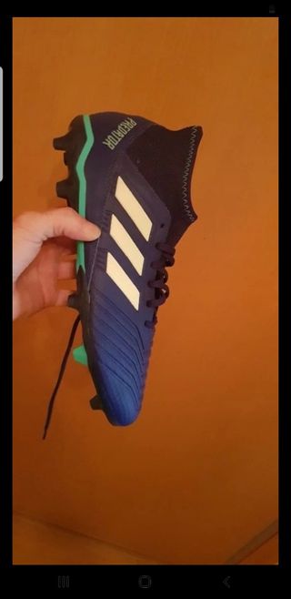 Pelota Firmada y botas de fútbol de David Aganzo