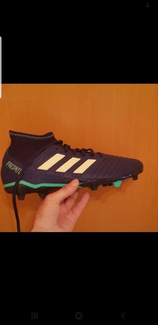 Pelota Firmada y botas de fútbol de David Aganzo