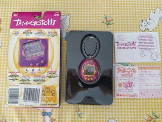 1997 Bandai Tamagotchi Original Purple Clockface