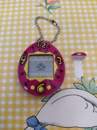 1997 Bandai Tamagotchi Original Purple Clockface