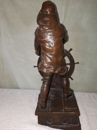 Figura de bronce