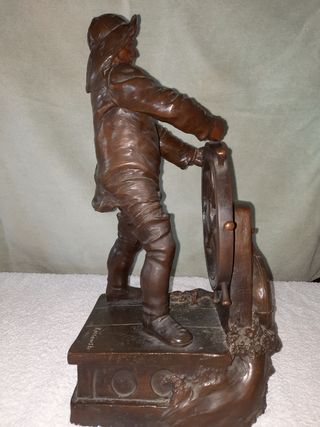 Figura de bronce