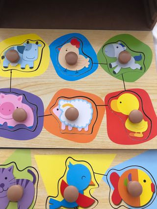 Puzzles de madera en su caja también de madera