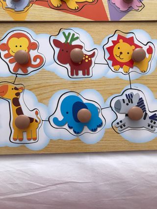 Puzzles de madera en su caja también de madera