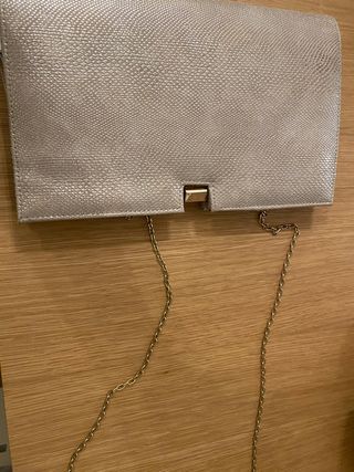 Bolso cartera fiesta Parfois. Metalizado.
