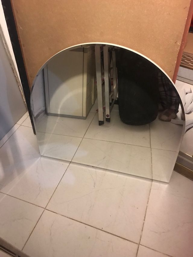 Espejo en forma de arco
