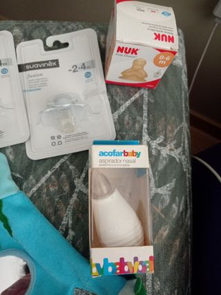 Lote. Aspirador nasal, chupetes, manta juegos,