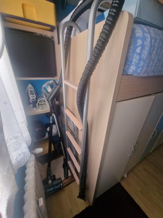 Habitación juvenil cama nido con armario debajo