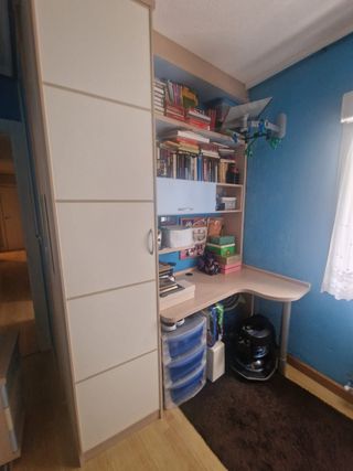 Habitación juvenil cama nido con armario debajo