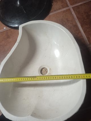 lavabo de piedra natural.