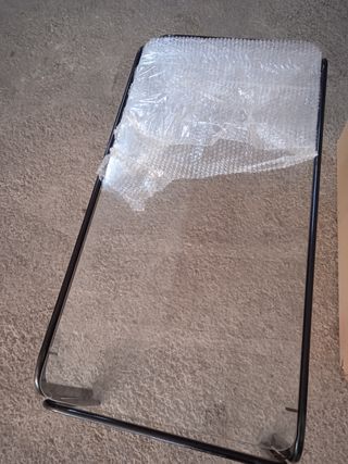 mesa de cristal y hierro