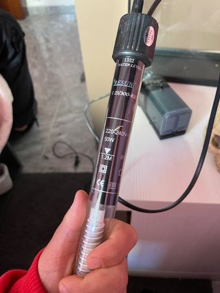 Acuario con filtro y calentador